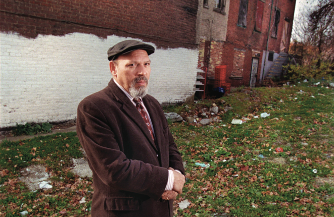 Portrait of August Wilson in front of 1727 Bedford Avenue